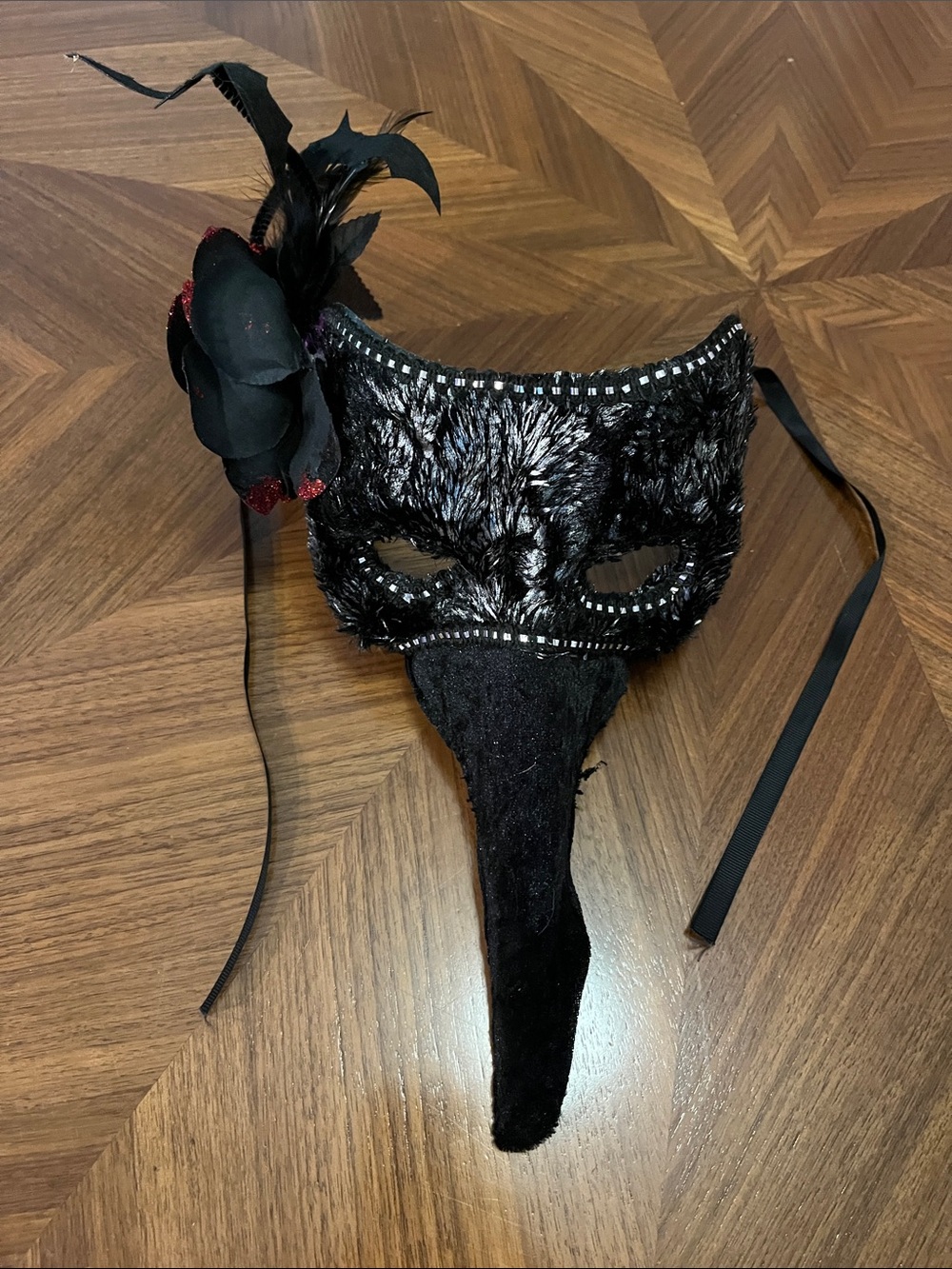 Black Feathered Venetian Plague Mask with Flower Accent